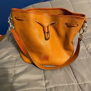 Dooney and Bourke: brown leather, bucket bag